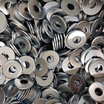 A close up of a pile of washer fasteners